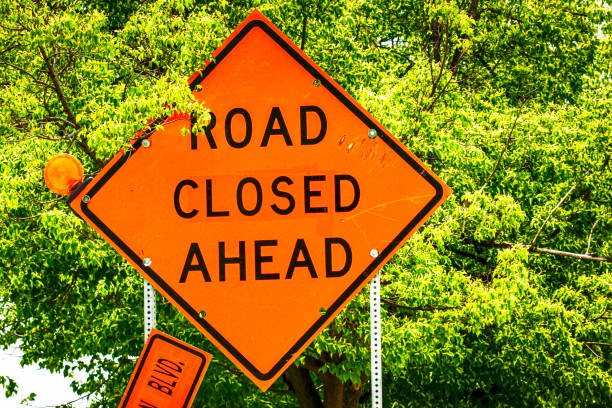 istock Bright Orange Road Closed Ahead sign 538994228