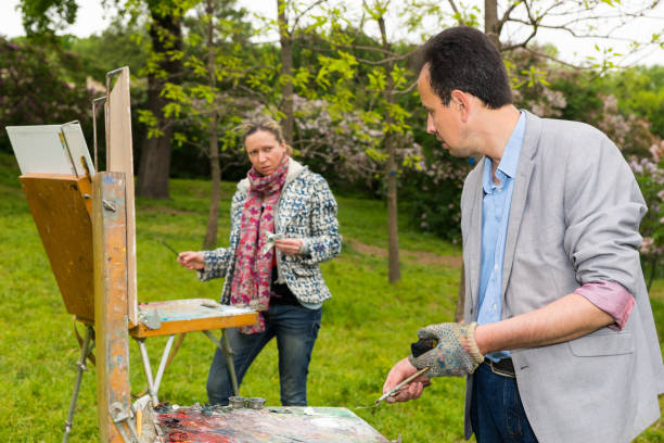 istock Two professional painters working in the open air 538994710