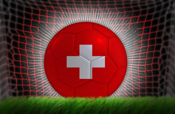 istock Soccer ball in net with Swiss flag 538995628