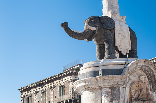 The famous lava stone statue of an elephant and its obelisk in Catania, Sicily, the symbol of the townThe famous lava stone statue of an elephant and its obelisk in Catania, Sicily, the symbol of the town