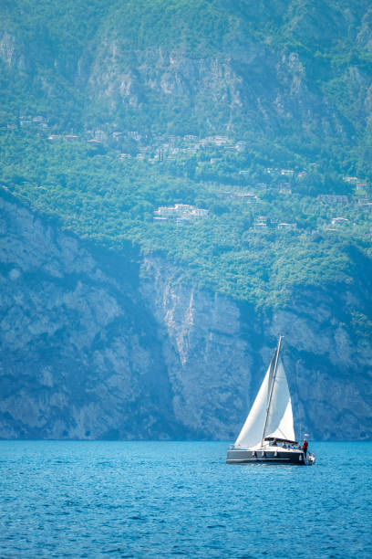 istock Sailer boat floating by waves of lake 538997578