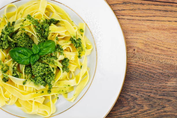 istock Fettuccine and Tagliatelle with Basil Pesto 538998640