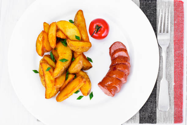 Fried Potato Wedges in a Rural and Sausage Studio Photo
