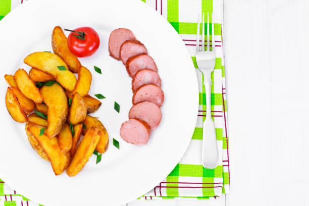 Fried Potato Wedges in a Rural and Sausage Studio Photo