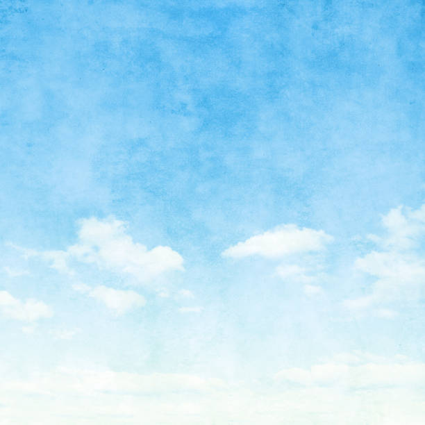istock Blue sky with clouds in grunge style. 539001024