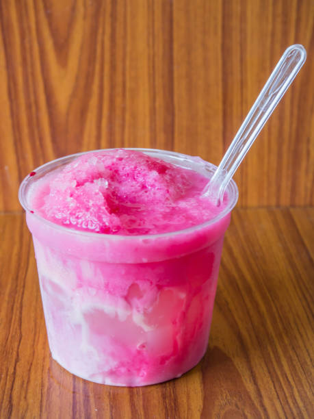 istock Pink smoothies on the brown wooden background.Refreshed drink. 539001436