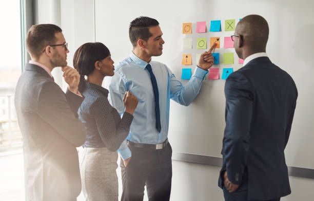 istock Multiracial group of colleagues discussing a plan 539001568
