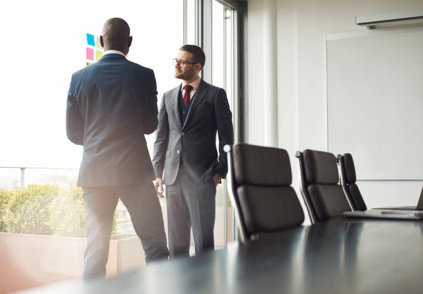 istock Two businessmen standing talking together 539001956
