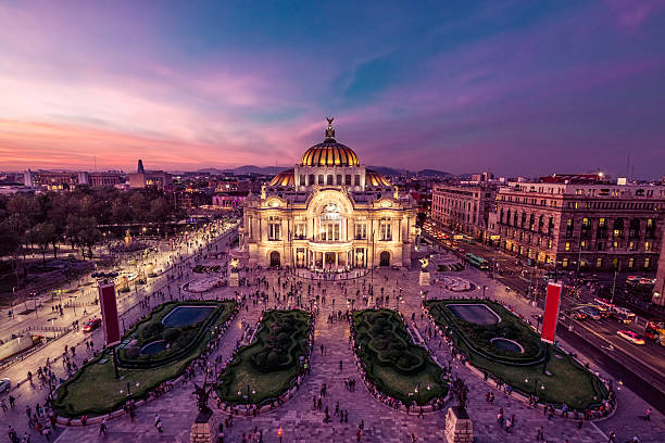 Mexico City's Downtown At Twilight Fantastic view Mexico City's downtown at twilight. The nightlife of the city can be seen around the Palacio de Bellas Artes building in foreground. historic district photos stock pictures, royalty-free photos & images