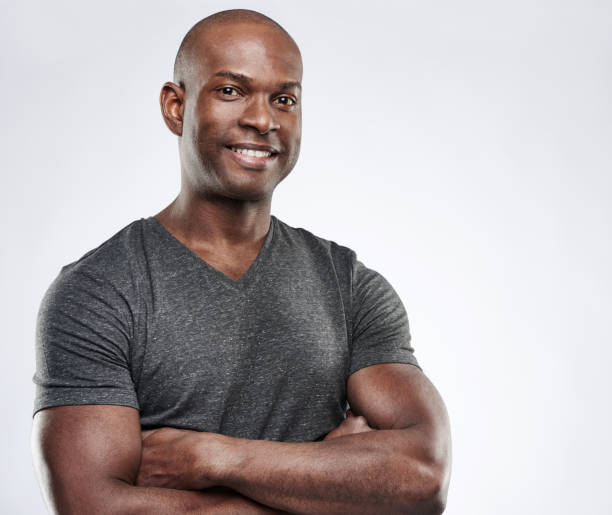 istock Man with folded muscular arms looking ahead 539002332