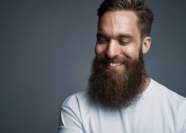 istock Happy young man with large fuzzy beard 539002528