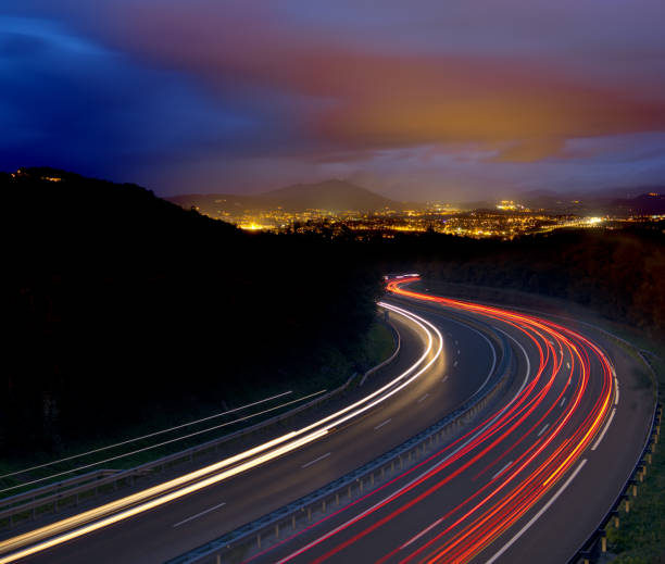 istock Car lights at night go to the city. 539003338