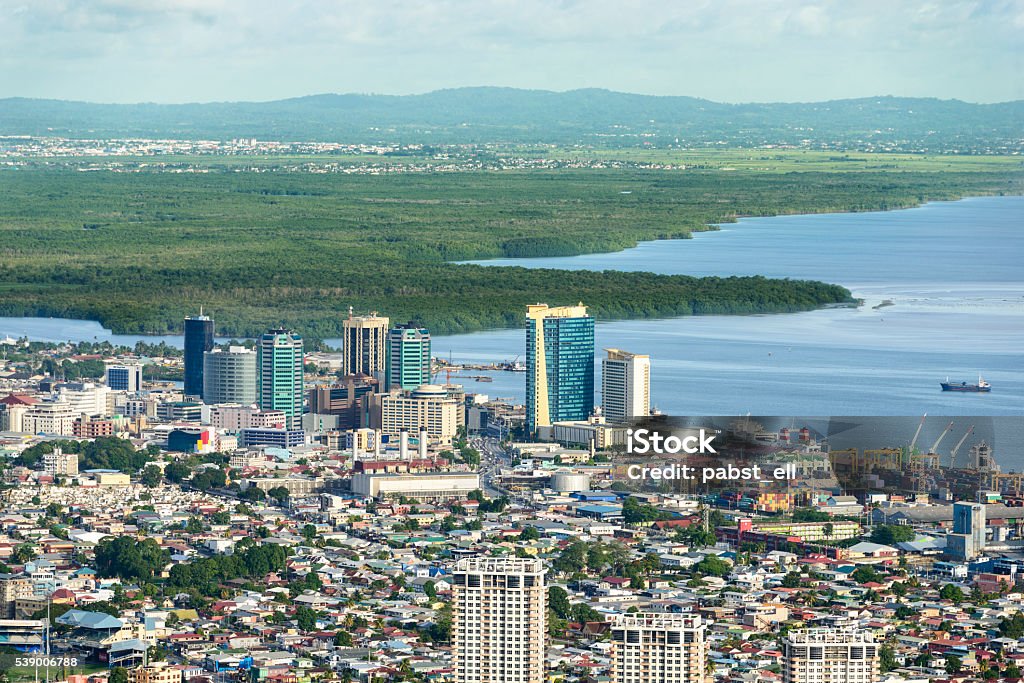 Downtown Port of Spain View from above of Skyline downtown Port of Spain city. Buildings by the port with Caroni area on the background. Trinidad And Tobago Stock Photo