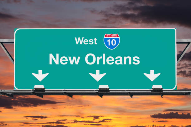 istock New Orleans Interstate 10 West Highway Sign with Sunrise 539007468
