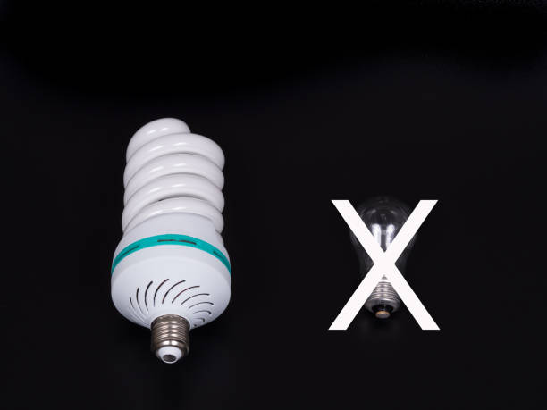 Energy saving lamp isolated on black background.