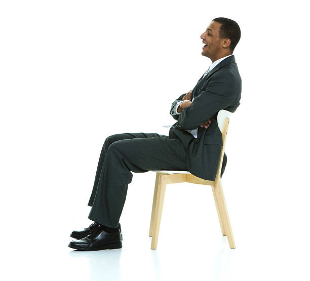 istock Cheerful businessman sitting on chair 539010012