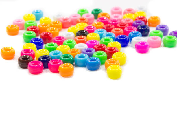 Beads The colorful beads isolated on white background Bead stock pictures, royalty-free photos & images