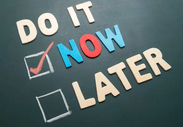 Photo of Do It Now or Later with checkbox and red check