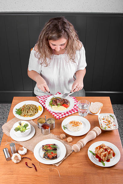istock Single Young Beautiful Curly Hair Woman waiting before have dinner 539016058