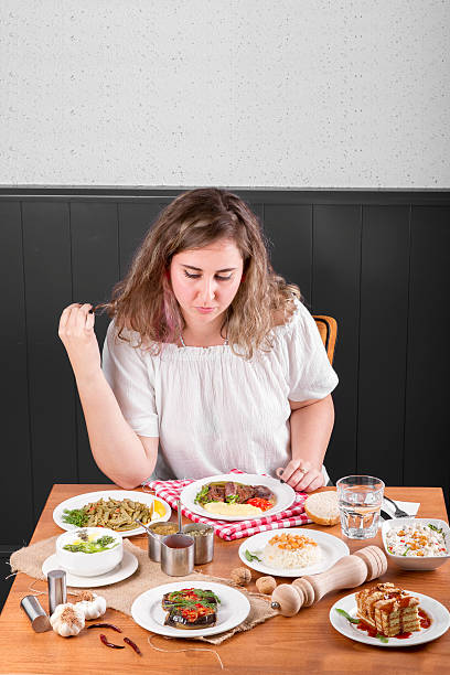 istock Single Young Beautiful Curly Hair Woman waiting before have dinner 539016598