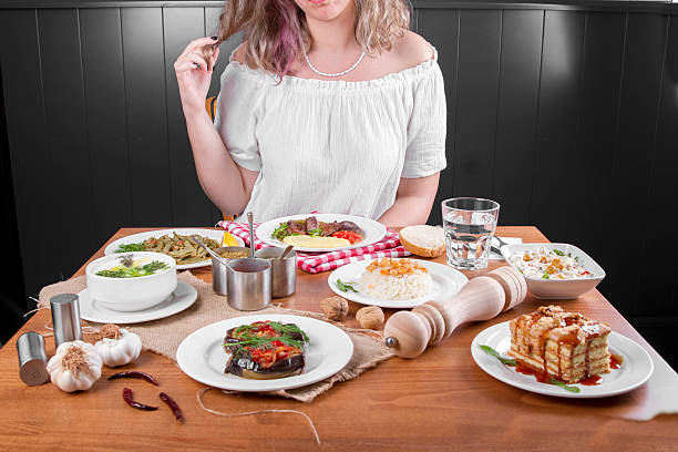istock Single Young Beautiful Curly Hair Woman waiting before have dinner 539016852