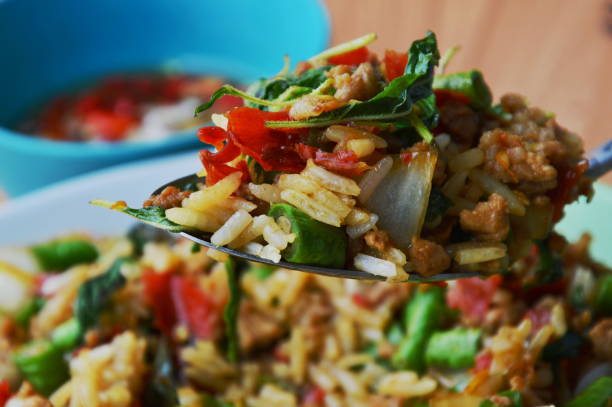 istock stir-fried spicy minced pork with basil leaf and rice 539017378