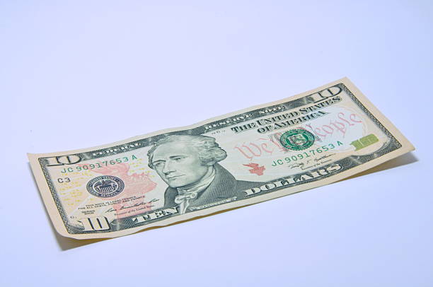 istock American 10 U.S. dollars on a white background 539018939