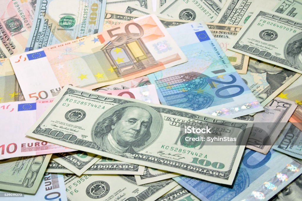 many dollar and euro, close-up To see more of my financial images click on the link below: 2015 Stock Photo