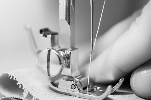 Close-up of sewing process