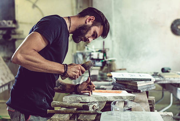 Stonecutter portrait at work Stonecutter portrait at work, Ljubljana, Slovenia sculptor stock pictures, royalty-free photos & images