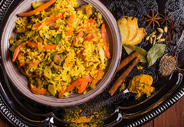 Indian Biryani with chicken and spices Indian Biryani with chicken and spices in traditional style barberry family photos stock pictures, royalty-free photos & images