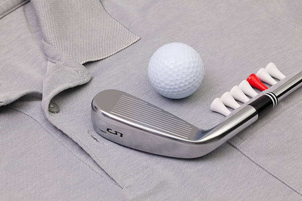 istock Grey polo shirt and golf equipments 539025228