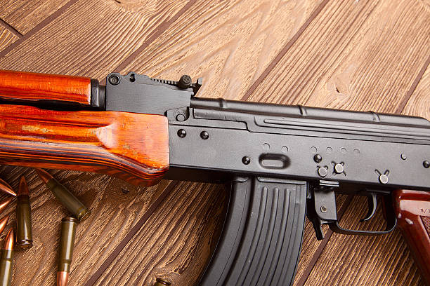 istock Kalashnikov assault rifles with ammunition 539026275