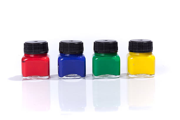 istock Four paint bottles in prime colors 539027312