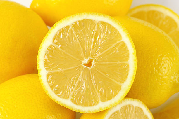 istock whole and halved lemons 539027988