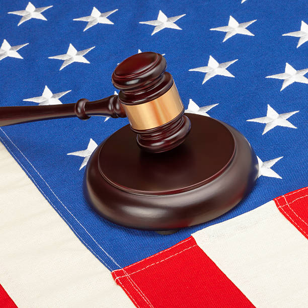istock Judge gavel over US flag - closeup studio shot 539039419