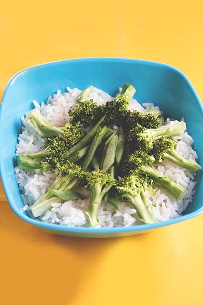 istock Blue bowl filled with fresh rice and vegetable 539055075