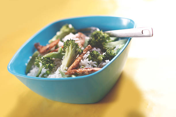 istock Blue bowl filled with fresh rice and vegetable 539055099