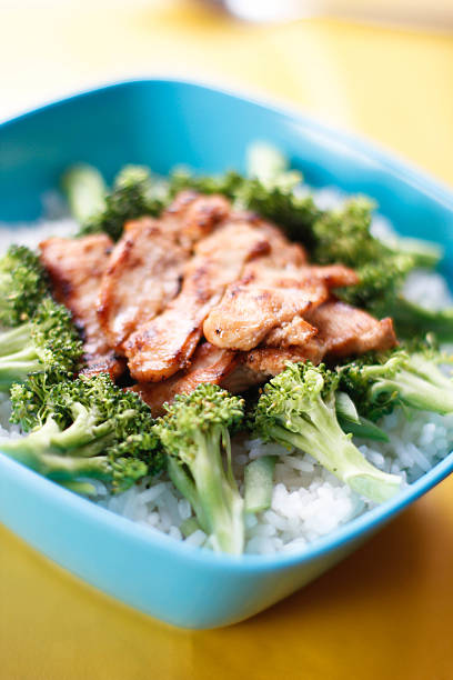 istock Blue bowl filled with fresh rice and vegetable 539055111