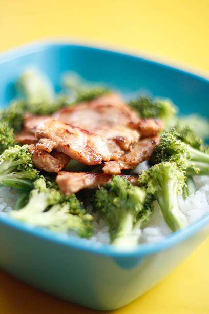 istock Blue bowl filled with fresh rice and vegetable 539055123