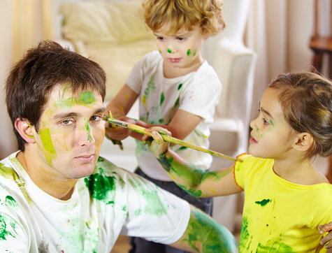 Shot of a dad being painted by his childrenhttp://195.154.178.81/DATA/i_collage/pi/shoots/785152.jpg