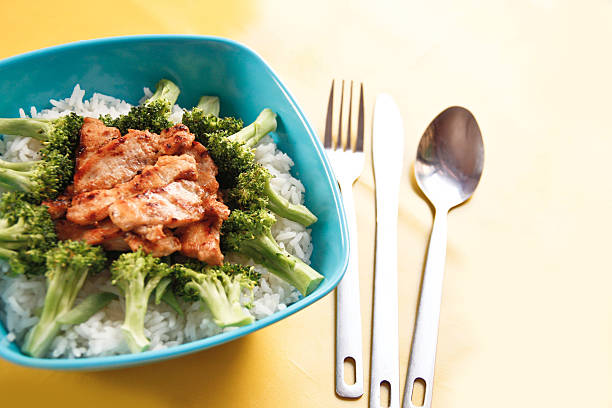 istock Blue bowl filled with fresh rice and vegetable 539058883