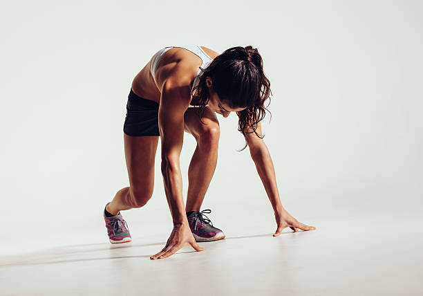 istock Fit female athlete ready to run 539072795
