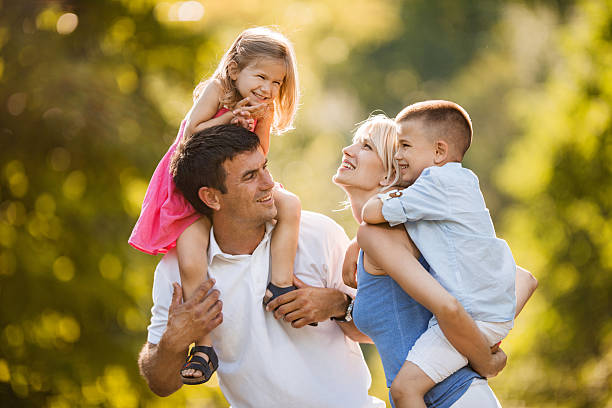 istock Playful family outdoors. 539078237