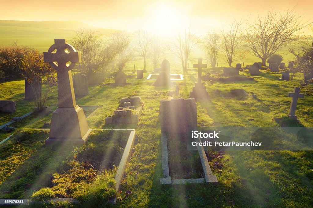Afterlife Heavenly light shining upon a old graveyard in England, United Kingdom. 2015 Stock Photo