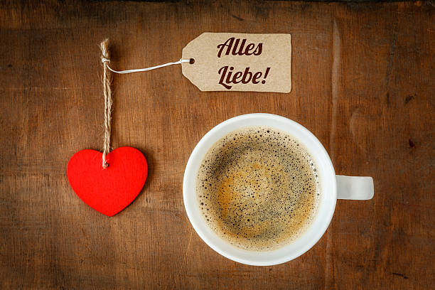 istock Coffee cup and heart on dark wood, Much love 539078857