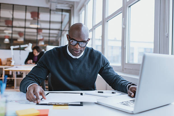 istock African man busy working at is desk 539079571