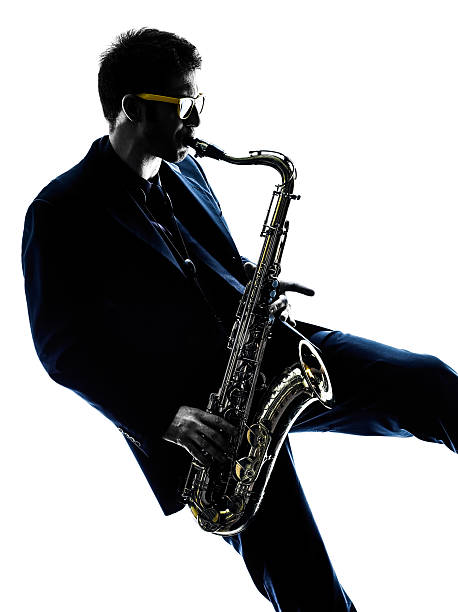 istock man saxophonist playing saxophone player  silhouette 539080289