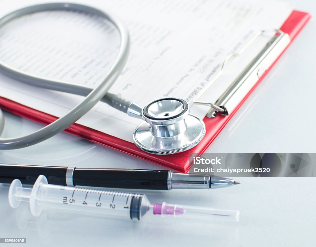 Medical history on clipboard with stethoscope on light background 2015 Stock Photo