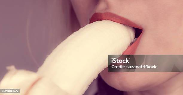 Woman Eating Banana Stock Photo - Download Image Now - Eating, Sensuality, Women